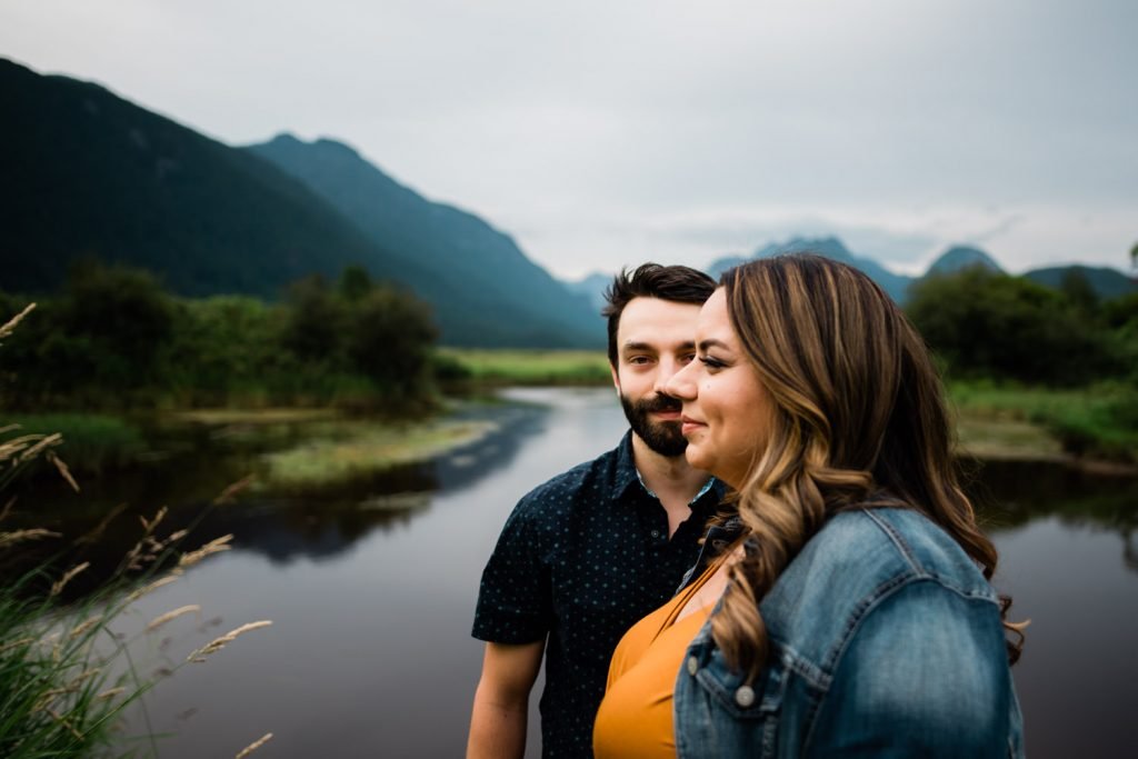 Pitt Lake, BC.  Engagement photos with couple in front of mountains. 