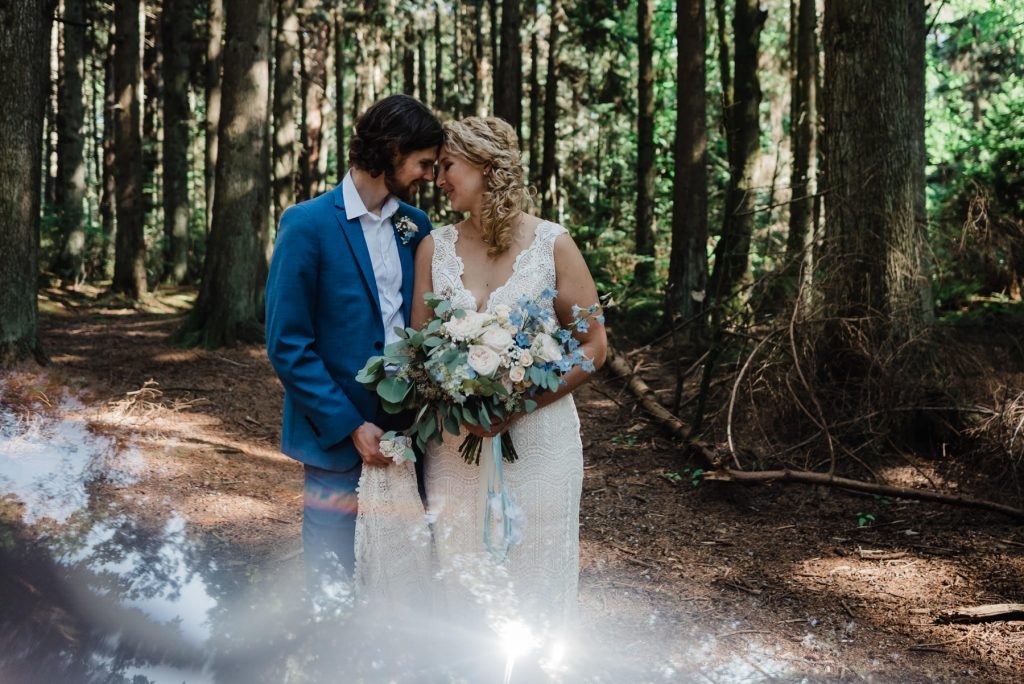 Intimate elopement in Stanley Park, bride and groom portraits. 