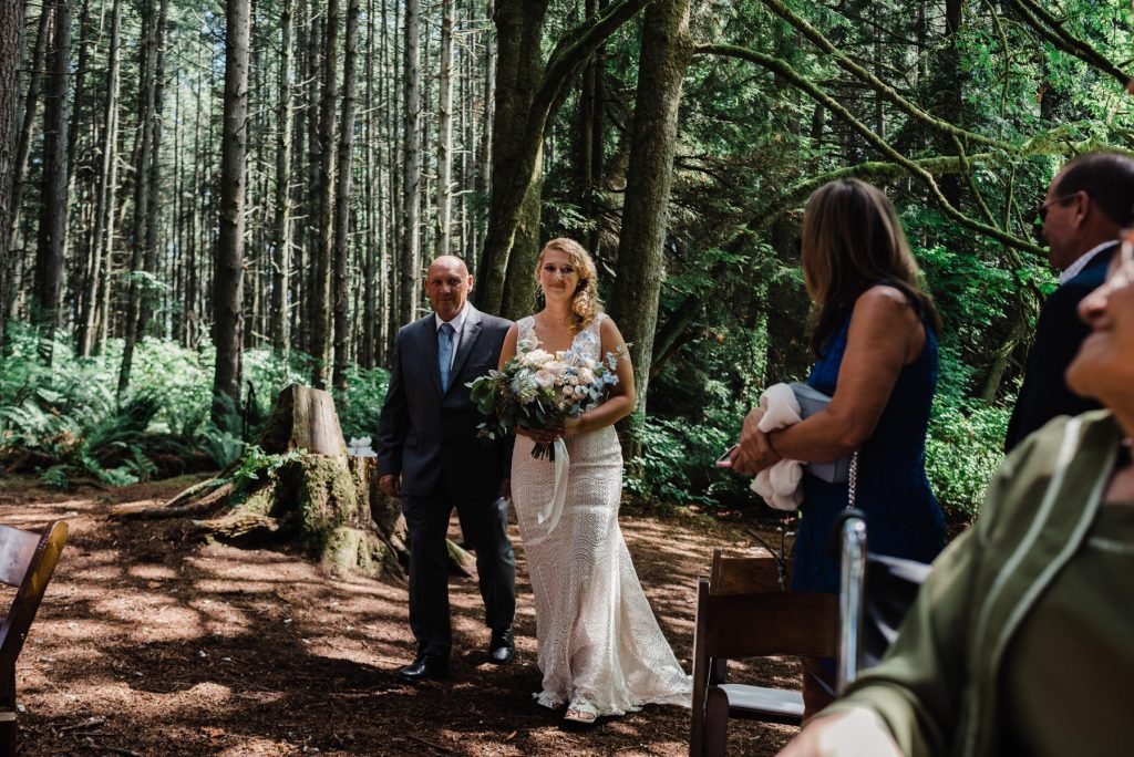 Bride walks down the aisle in this intimate elopement.