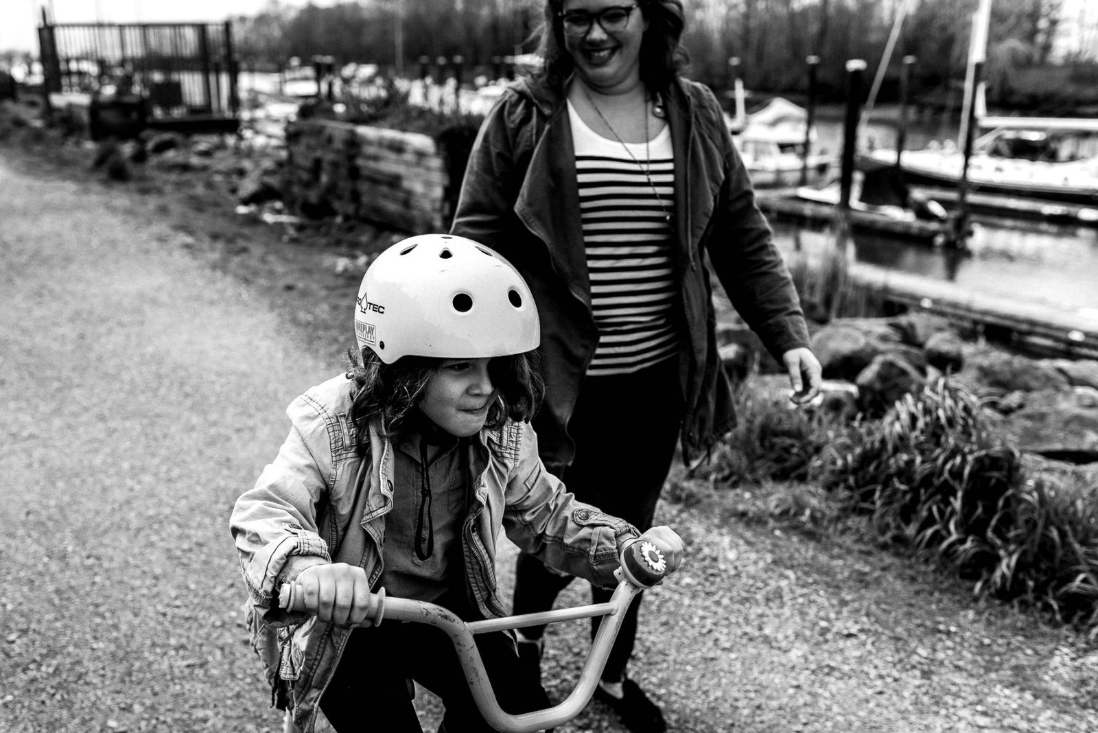 Documentary family photos in Ladner BC. Girl rides her bike.