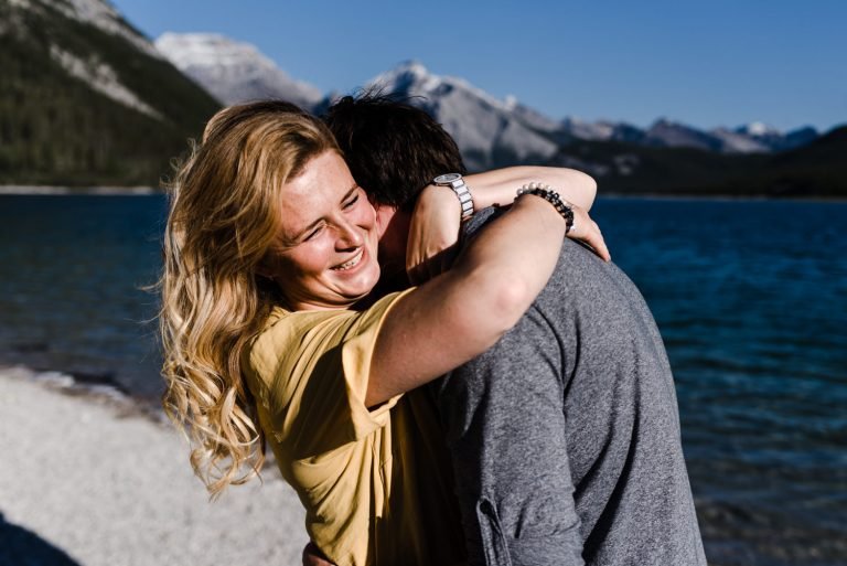 Canmore engagement session couple hugs.